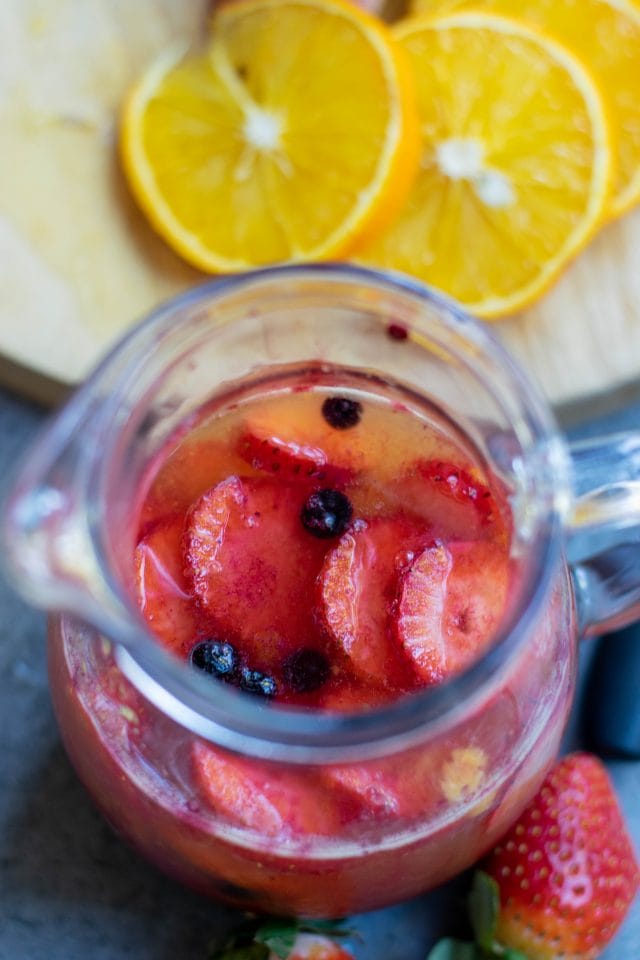 This Mango Sangria recipe is ideal for a special occasion, get-togethers or whenever you want a special cocktail. This sangria recipe is so simple to make and you will love the colorful, fruity combination. Make a pitcher of this fruity sangria for your next girl's night in.  