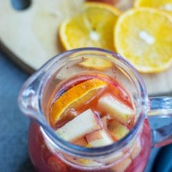 This Mango Sangria recipe is ideal for a special occasion, get-togethers or whenever you want a special cocktail. This sangria recipe is so simple to make and you will love the colorful, fruity combination. Make a pitcher of this fruity sangria for your next girl's night in.  