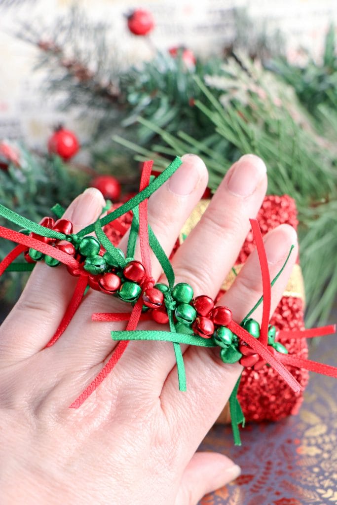 This DIY Jingle Bells Christmas Bracelet is the perfect way to spend time with your loved ones and make great memories and gift.