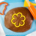 This chocolate homemade playdough recipe is made with just two ingredients and is a terrific activity for younger kids. Edible playdough is a yummy fun with food activity.