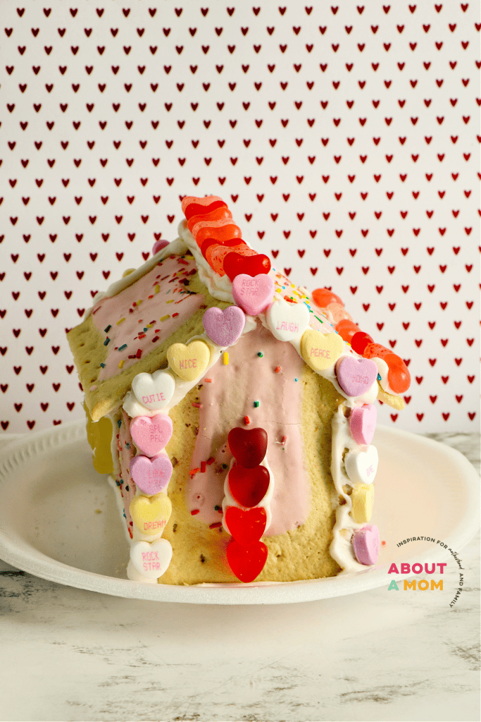 If you are a fan of making of gingerbread houses for the Christmas holiday, then this cute little Valentine's Day themed project is for you. This Valentine's Day Pop Tart House is such a fun, creative and oh-so yummy Valentin's Day activity for kids.