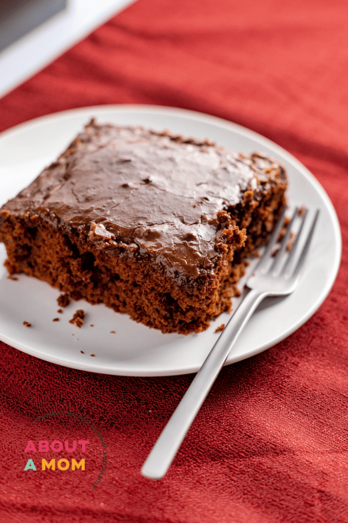 This cherry chocolate cake is so simple to make but is decadent enough for special occasions. A moist chocolate cake mix and a can of cherry pie filling come together for a fudgy and delicious dessert. The fudge frosting puts this sheet cake over the top!