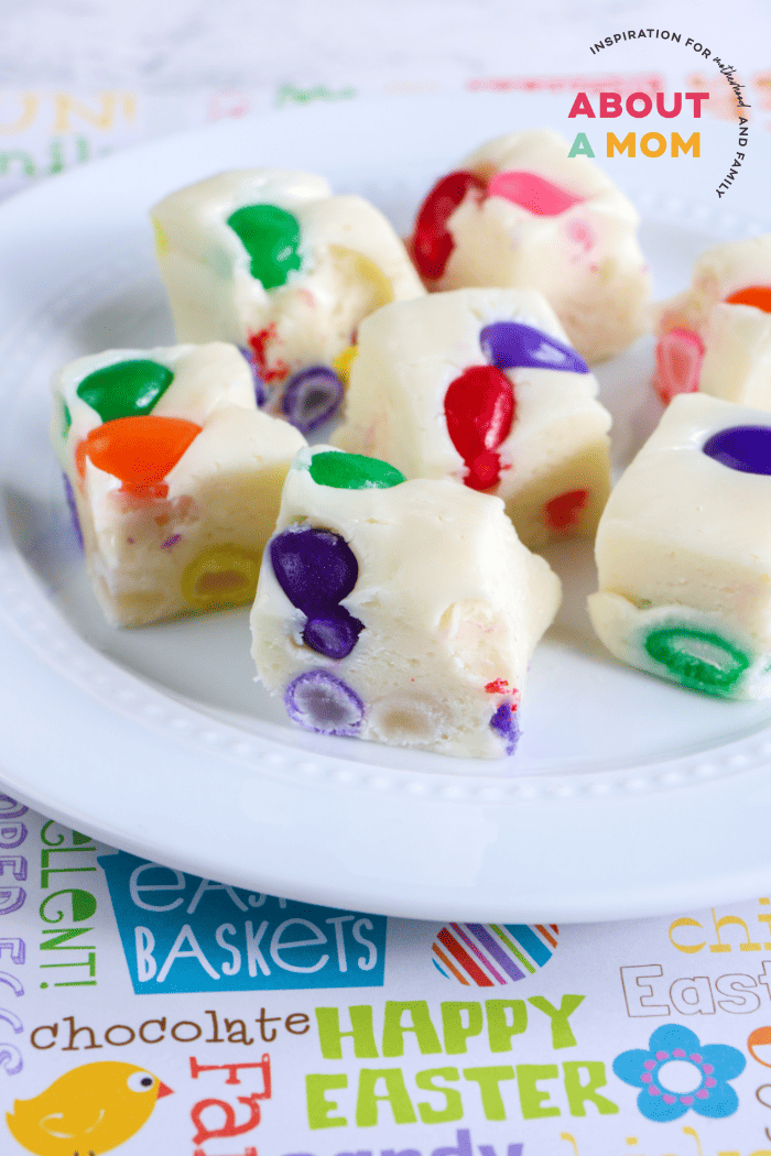 Looking for a sweet Easter treat? This Jelly Bean Fudge is just as delicious as it is beautiful! The beans pop from the fudge like brightly colored Easter eggs. Jelly Bean Fudge is simple to make and the perfect addition to your Easter dessert table.