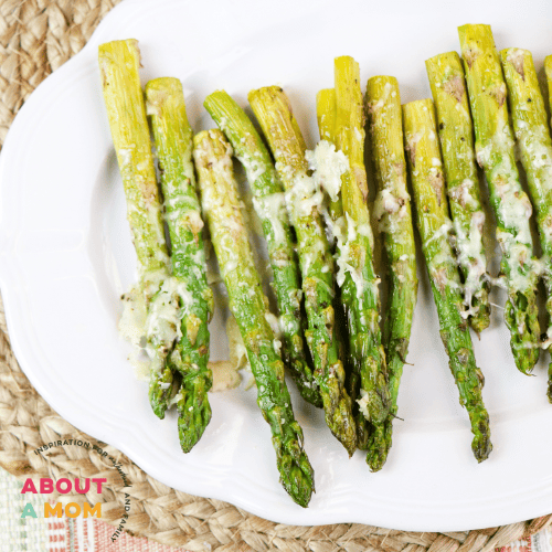 This Oven Baked Asparagus recipe makes a simple side dish that combines the flavors of garlic and parmesan. Great way to introduce a new vegetable side dish at dinner!
