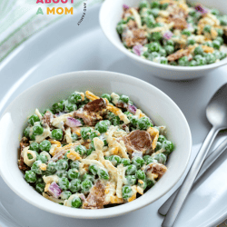 Peas, bacon, red onion, cheese and a creamy sauce come together to make a delicious classic pea salad that everyone will enjoy.