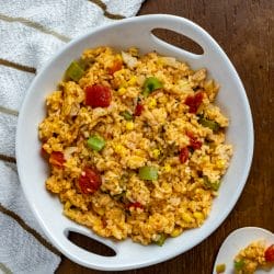 This is the best easy cheesy Mexican rice recipe. It is a restaurant-style Spanish rice recipe that comes together in no time.
