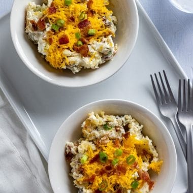Loaded with bacon, sour cream and cheese, you are going to love this loaded potato salad recipe.