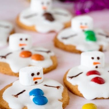 These oh-so cute and delicious Melted Snowman Cookies are sure to melt your heart this holiday season! Transform your favorite sugar cookies into melting snowmen in just a few easy steps.