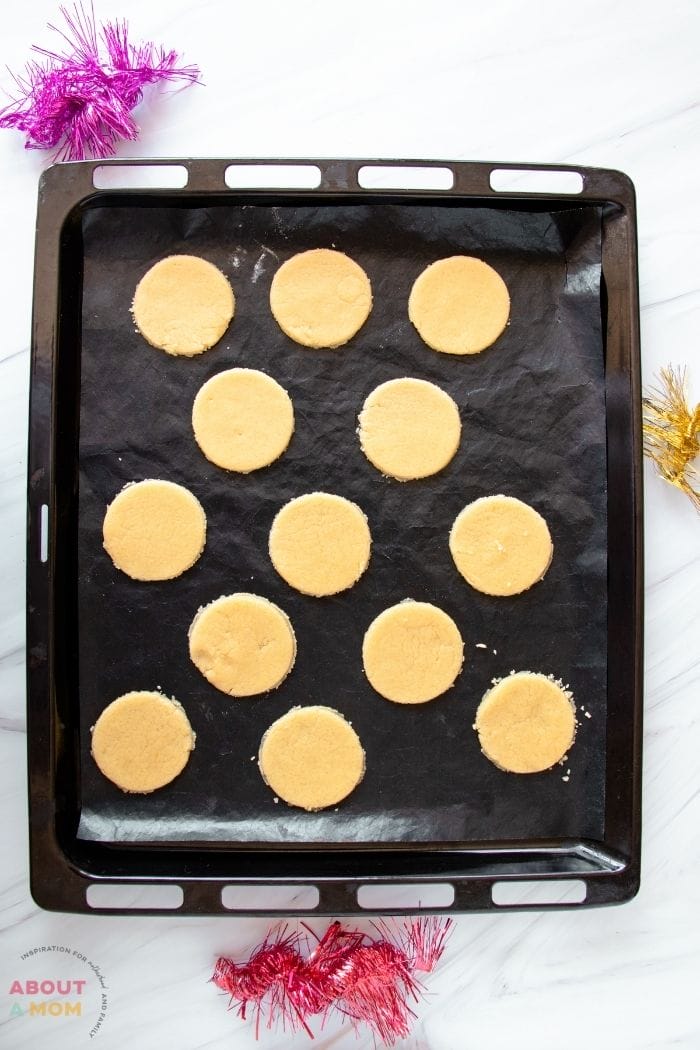 cutout cookies on a baking sheet ready to go into the oven