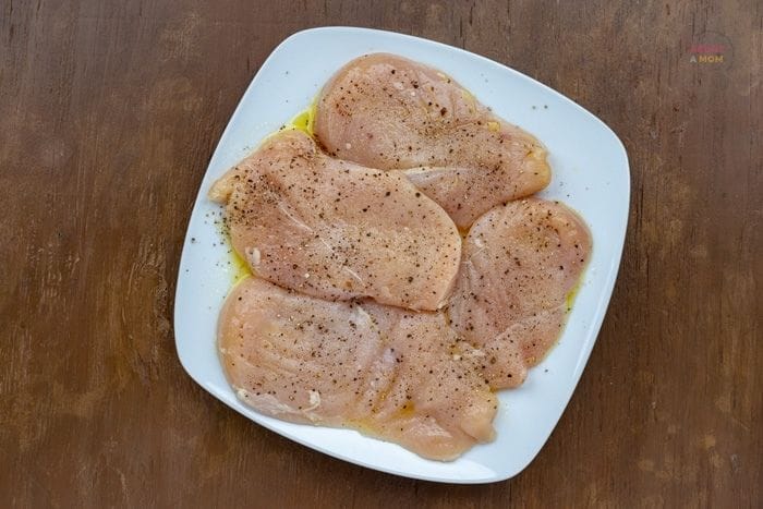 seasoned chicken breasts on a plate