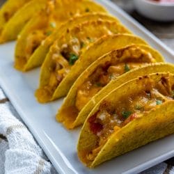 How to make tacos in the oven. Step by step directions to make out-of-this world oven baked chicken tacos.