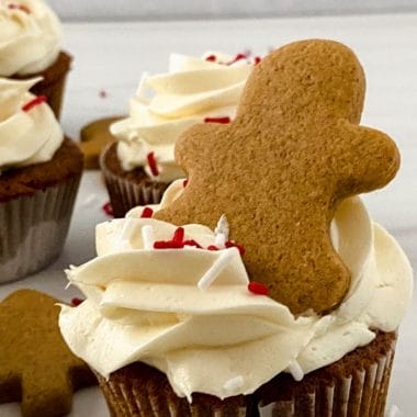 These Gingerbread Cupcakes with maple cream cheese frosting are made from scratch and the perfect non-cookie treat for your holiday party this year! Moist delicious cupcakes with a classic gingerbread flavor. The maple cream cheese frosting puts these Christmas cupcakes over the top.