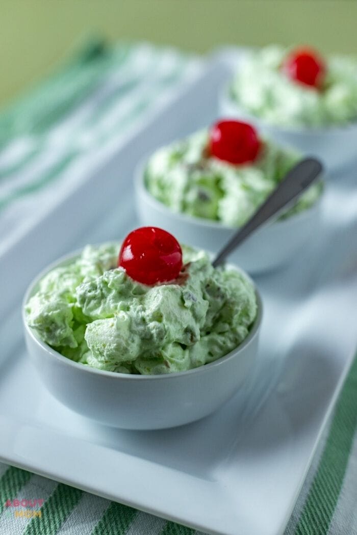 Also known as Watergate Salad and Pistachio Fluff, this Pistachio Pudding Salad is fluffy and sweet and can be served as either a side dish or dessert.