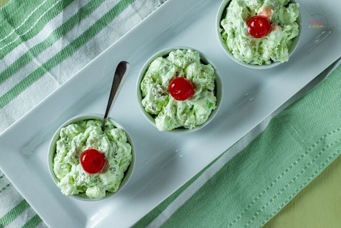 Also known as Watergate Salad and Pistachio Fluff, this Pistachio Pudding Salad is fluffy and sweet and can be served as either a side dish or dessert.