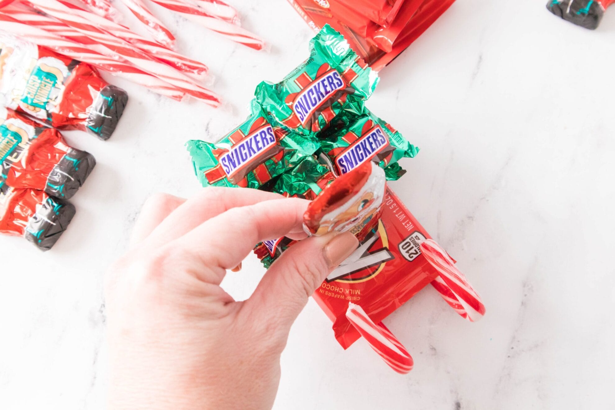 attach a chocolate Santa to the front of each sleigh