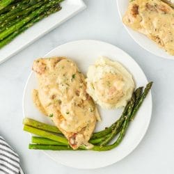 Serve up a taste of Italy with this Creamy Garlic Chicken Recipe. Tender chicken breasts are smothered in a creamy garlic sauce and cooked to perfection. This dish is easy to make and perfect for a quick weeknight meal!