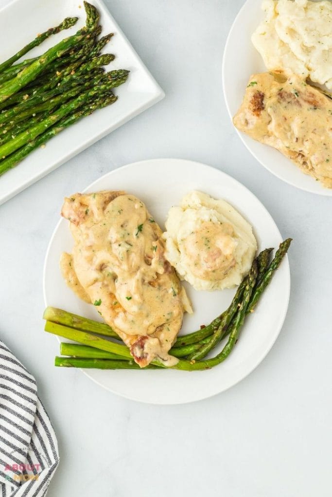 Serve up a taste of Italy with this Creamy Garlic Chicken Recipe. Tender chicken breasts are smothered in a creamy garlic sauce and cooked to perfection. This dish is easy to make and perfect for a quick weeknight meal!