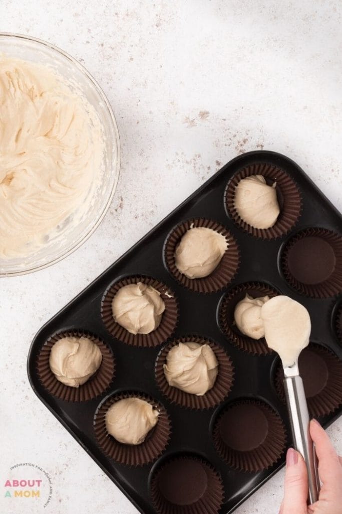 batter going into cupcake pans