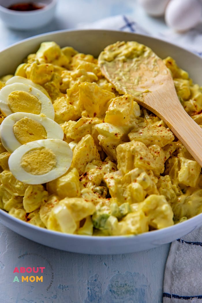 Southern-style Deviled Egg Potato Salad combines two classic favorites. This potato salad with eggs is perfect for any potluck, barbecue, or picnic, or anytime side dish. This is a terrific side dish for ham too!